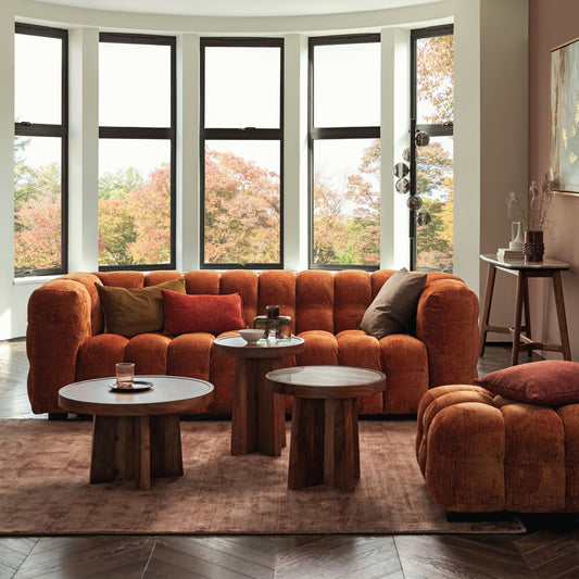 Vesper Sofa in burnt orange in a bright living room